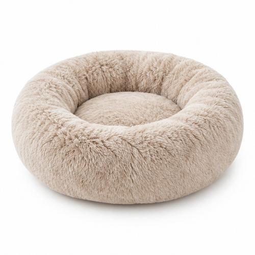 Oatmeal beige round calming pet bed with raised rim on a white background
